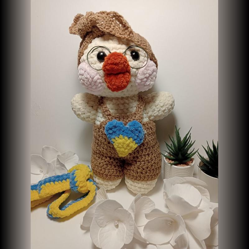 Pato de punto Lalafanfan con mono hecho a mano